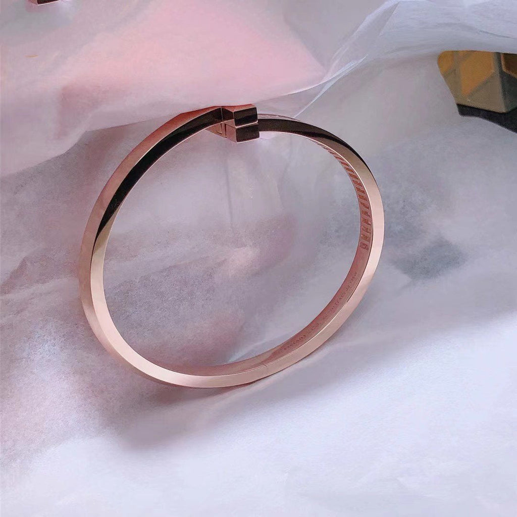 TIFFANY WIDE HINGED BANGLE PINK GOLD WITH BAGUETTE DIAMONDS