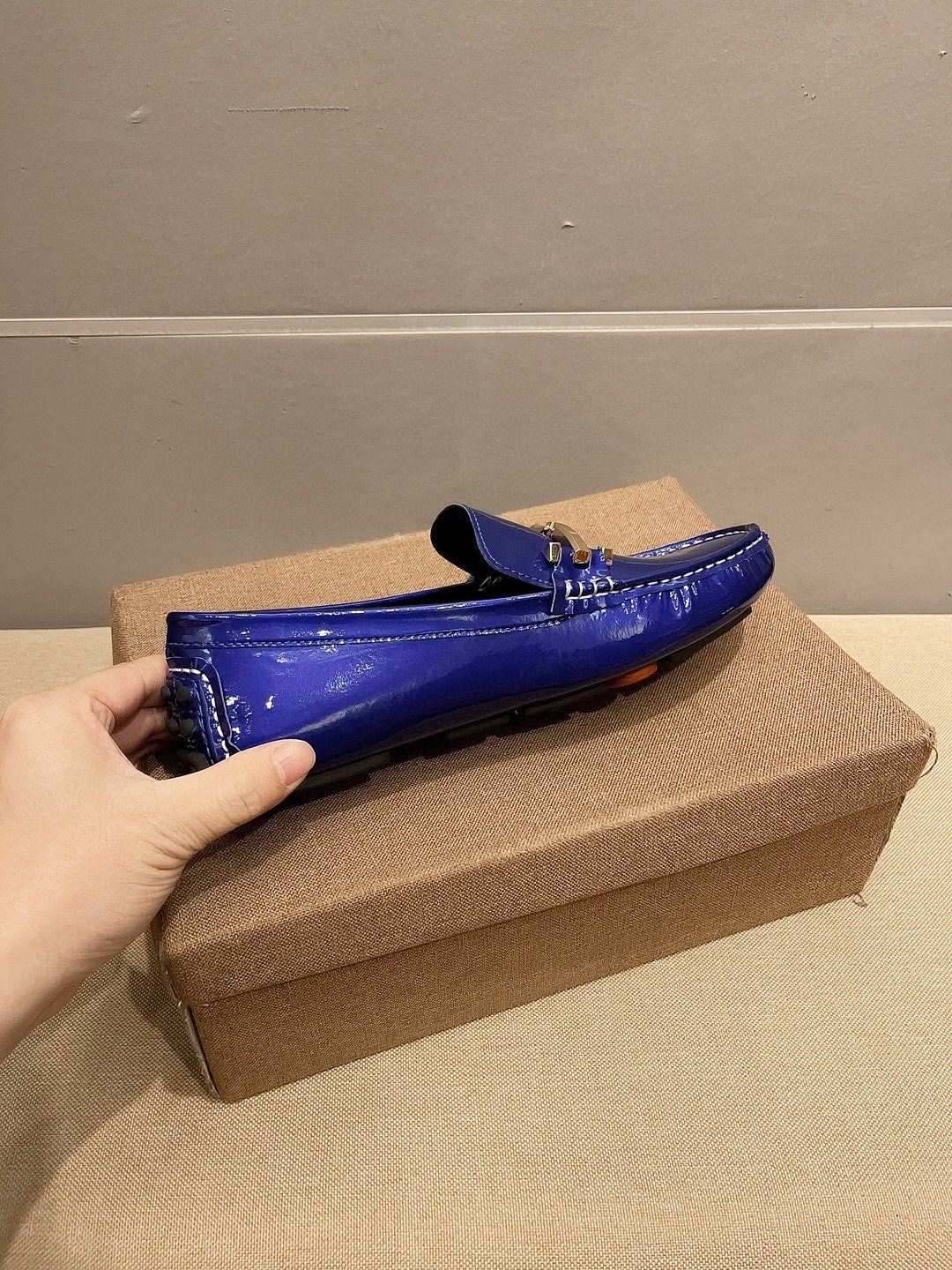 Tod's Glossy Metal Bar Loafers