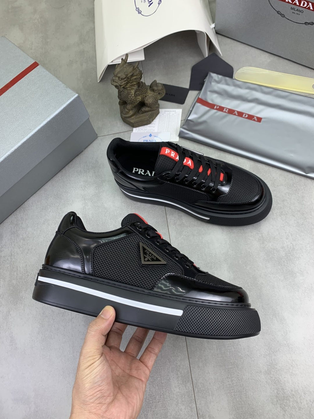 Prada Triangle Patch Low-Top Sneakers