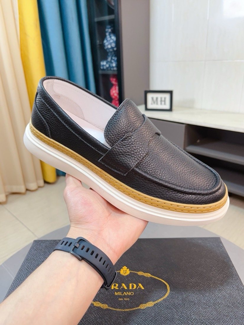 Prada Textured Slip-On Shoes